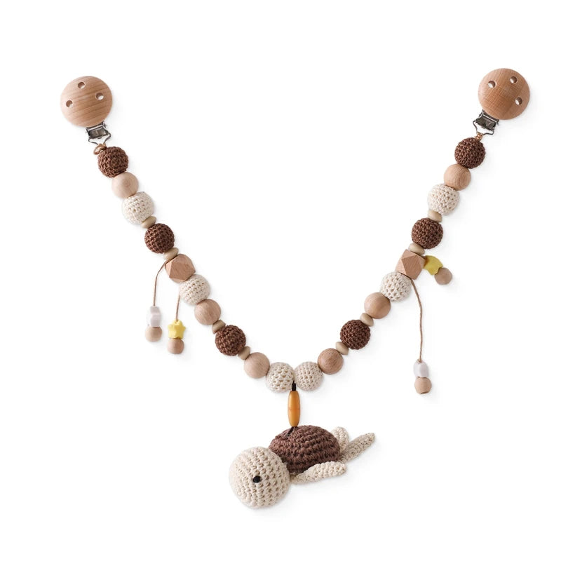Liebevolle Kinderwagenkette aus Häkelperlen & Holz – Für unterwegs mit deinem Baby