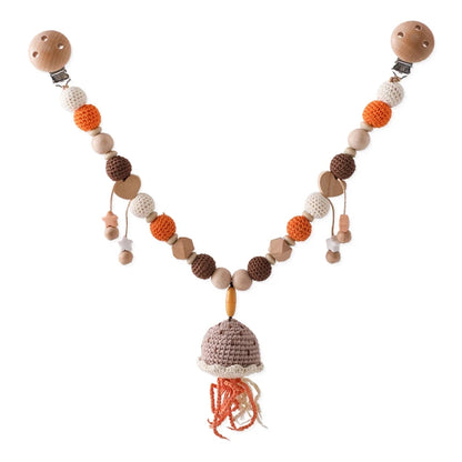 Liebevolle Kinderwagenkette aus Häkelperlen & Holz – Für unterwegs mit deinem Baby